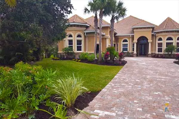 Landscape design, planting, mulch, and hardscape by CnC Landscapes